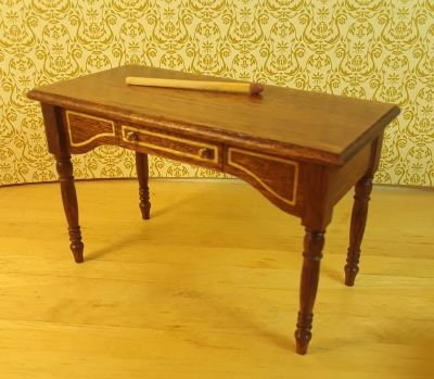Inlaid table with drawer